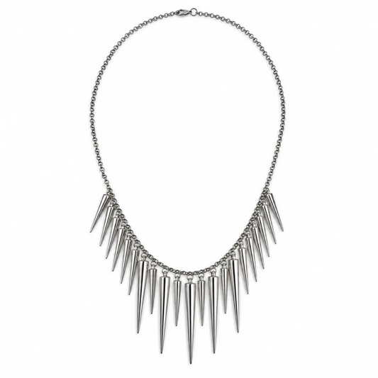 A silver-toned metal spike necklace with a delicate chain and multiple sharp conical spikes hanging from a central bar, shown on a plain white background.