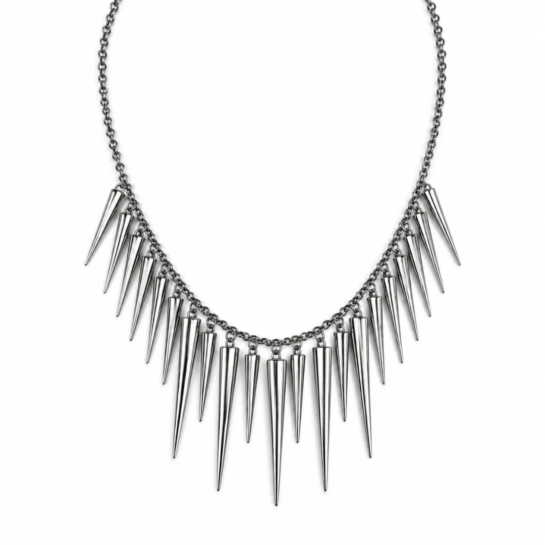A silver-toned spiked collar necklace with a delicate chain and multiple sharp conical spikes, shown against a plain white background.