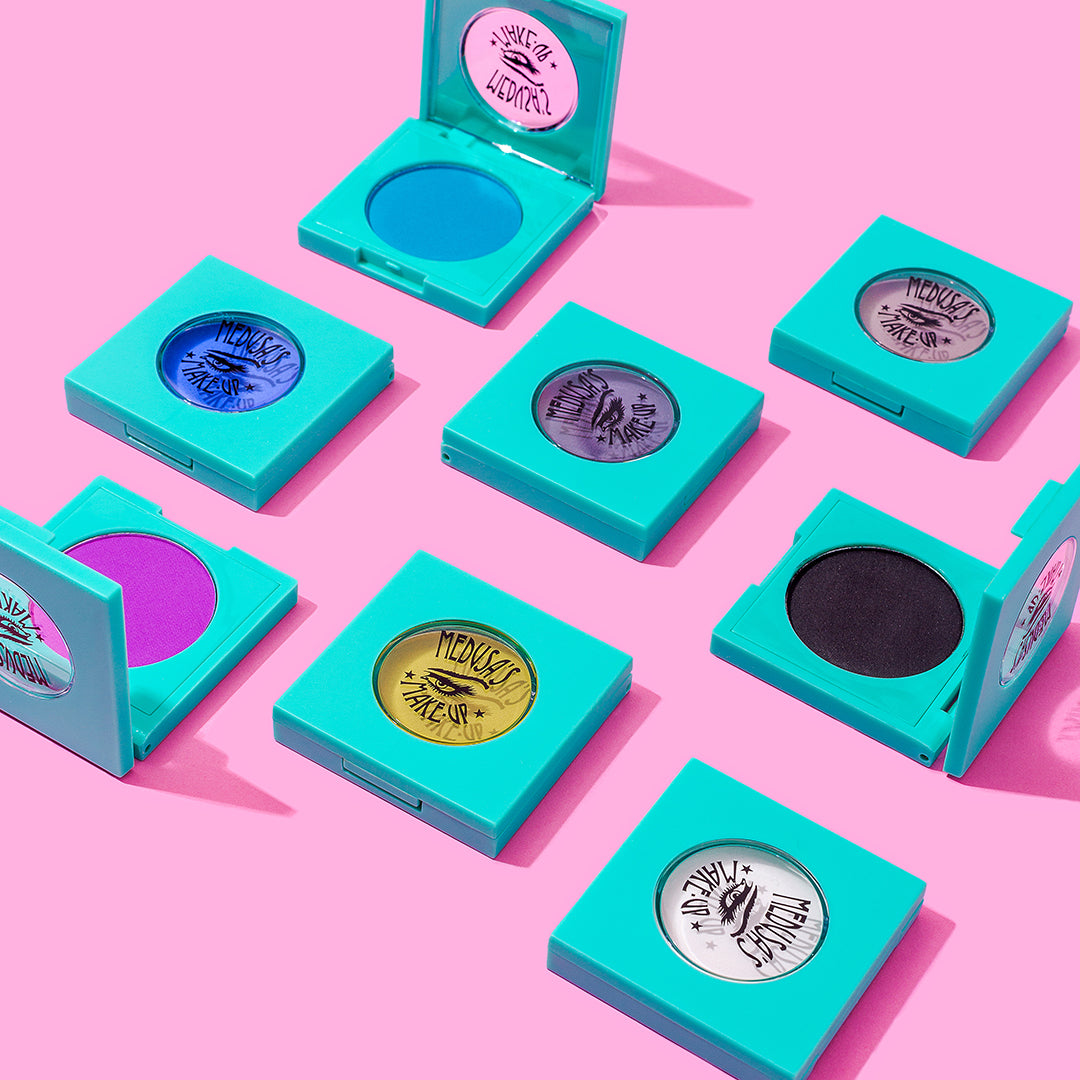 tropical matte eyeshadow collection on a pink background