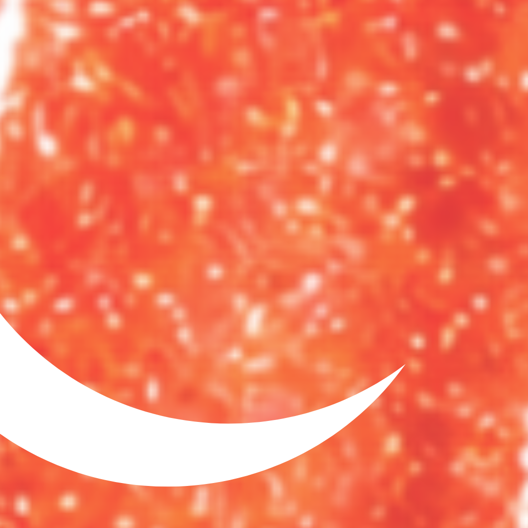 Close-up of a red and orange textured surface with a white crescent shape.