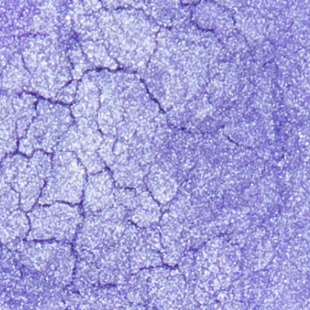 Close-up of a textured purple surface with cracks