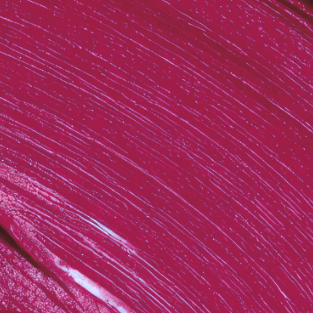 Close-up of pink lipstick texture with visible brush strokes