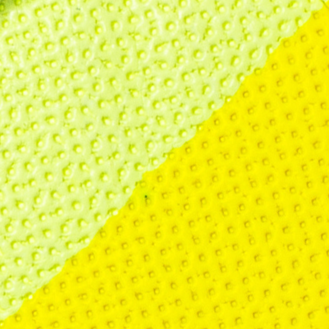 Close-up of a textured yellow and green surface