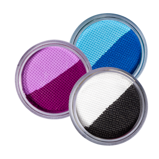 Three round containers with colorful powders on a white background