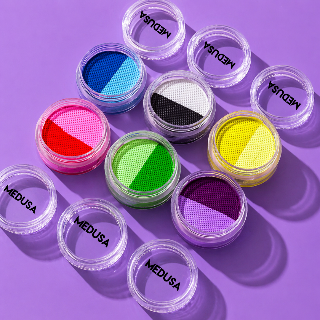 Set of colorful makeup powders in small jars with 'Medusa' branding on a purple background