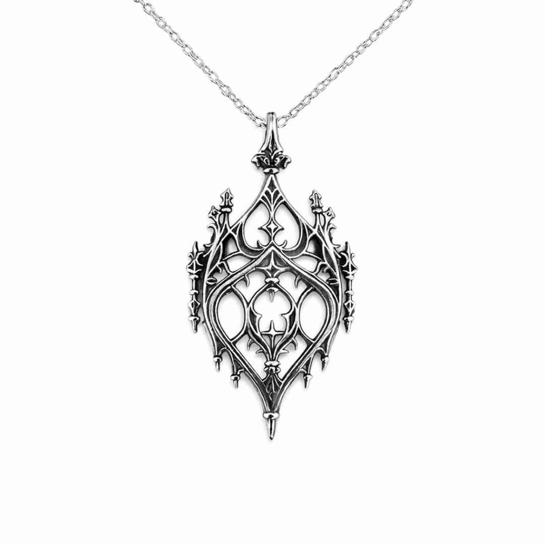 Decorative silver pendant on a white background