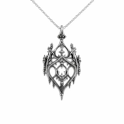 Decorative silver pendant on a white background
