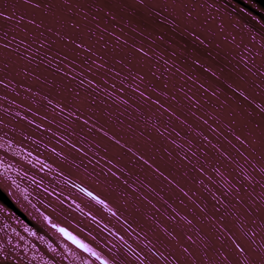 Close-up of a dark purple color swatch with textural variations