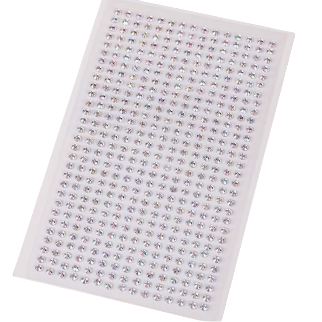 Sheet of rhinestone stickers on a white background