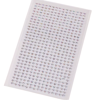 Sheet of rhinestone stickers on a white background