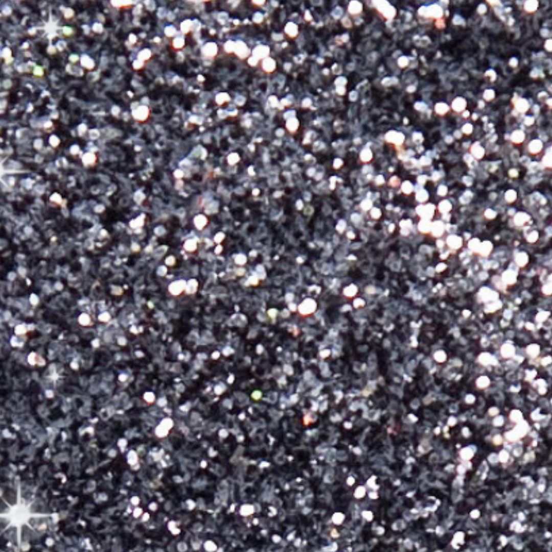 Close-up of black glitter with a sparkling effect