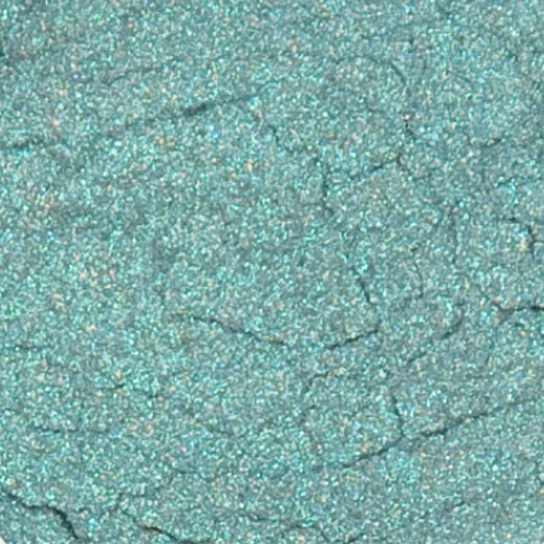 Close-up of teal glittery sand texture