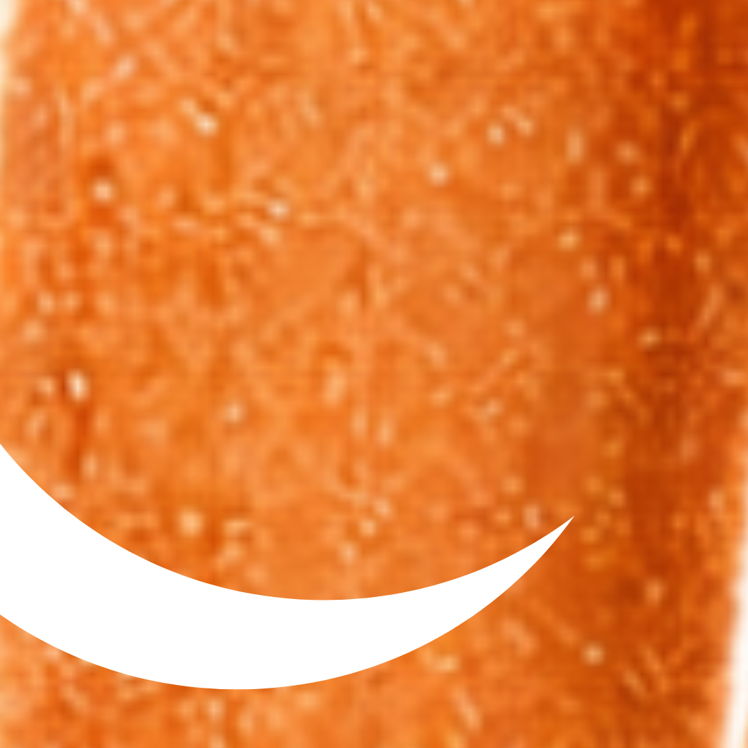 Close-up of a textured orange surface with a white curved line.