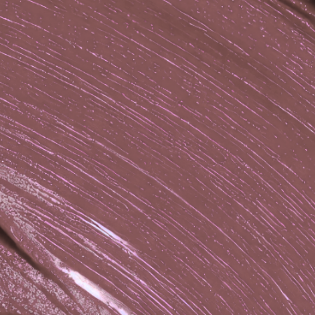 Close-up of a brownish-purple color swatch with a textured surface.