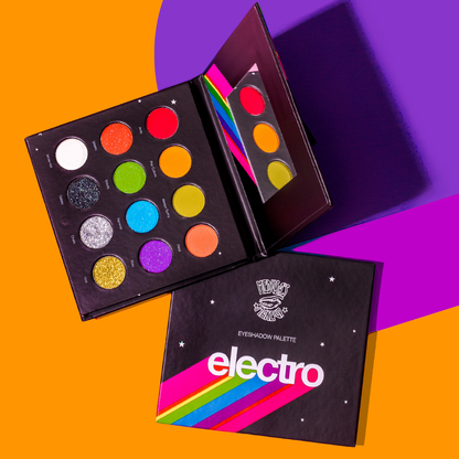 Eyeshadow palette with colorful shades on a vibrant background