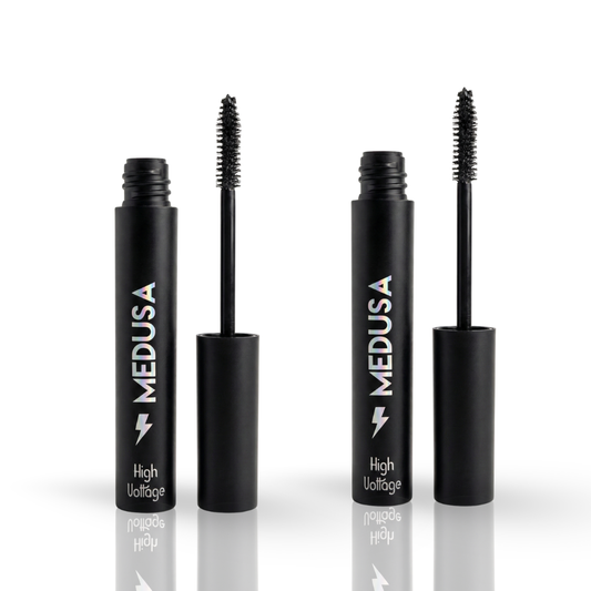 Two black mascara tubes with刷子 on a white background, branded 'MEDUSA'.