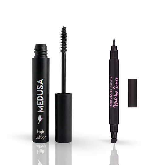 Black makeup products including mascara and eyeliner on a white background