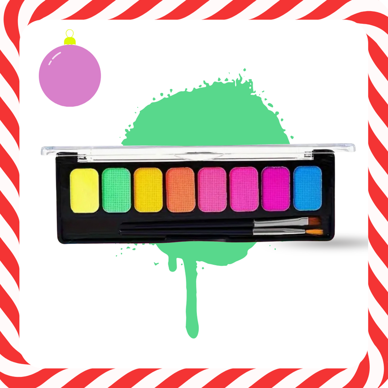 Colorful paint palette with brushes on a striped background
