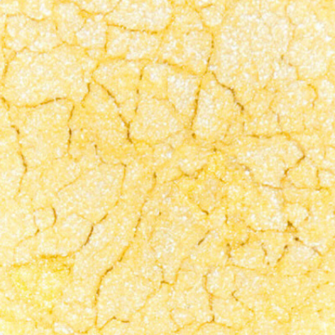 Close-up of a textured yellow surface