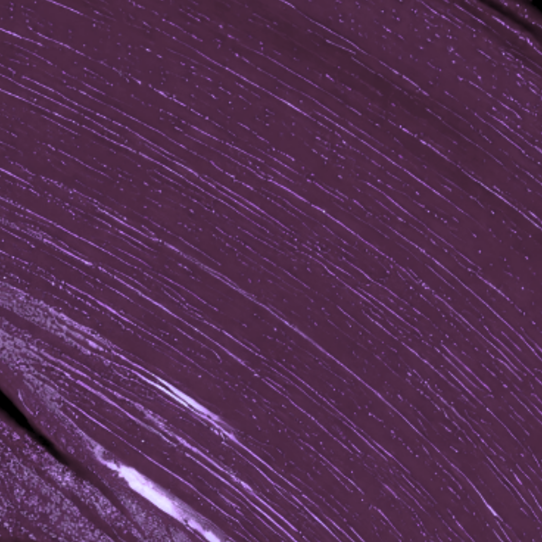 Close-up of a purple paint swatch with textured brush strokes