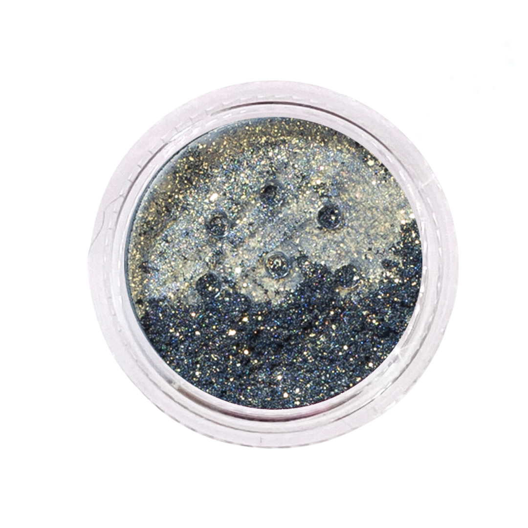 Silver glitter in a small round container on a white background