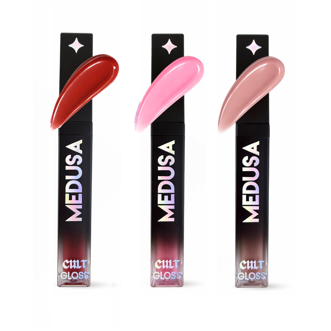 Three Medusa Cult Gloss lip glosses with different colors on a white background