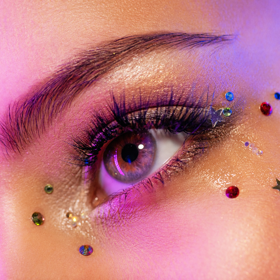 Model wearing shimmer eyedust and rhinestones