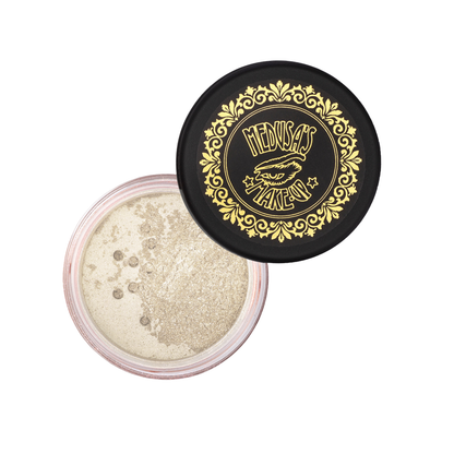 Open container of glittery powder with decorative lid featuring a brand logo on a white background