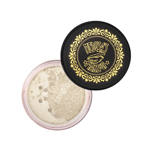 Open container of glittery powder with decorative lid featuring a brand logo on a white background