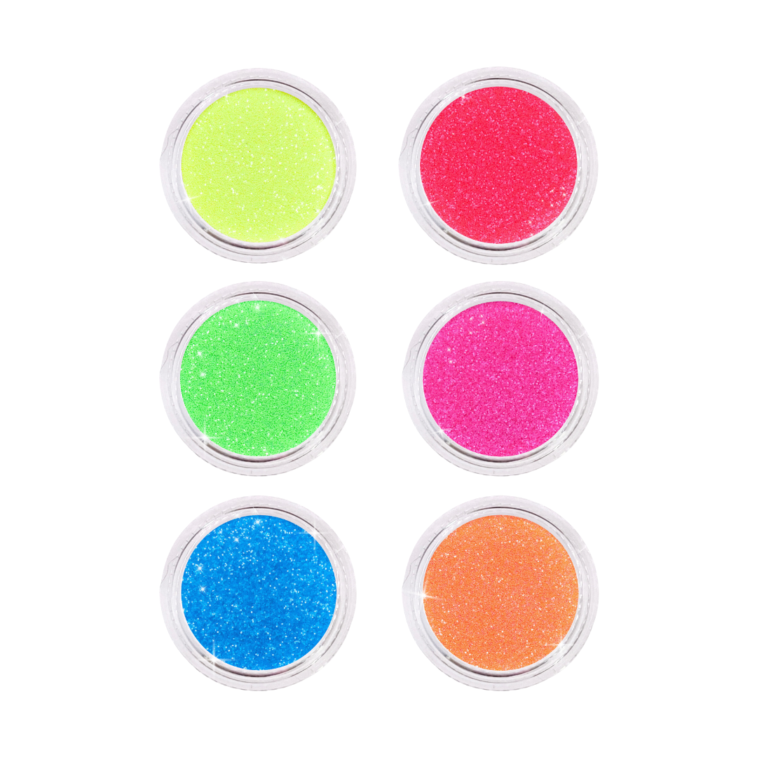 Set of six small round containers with colorful glittery substances on a white background