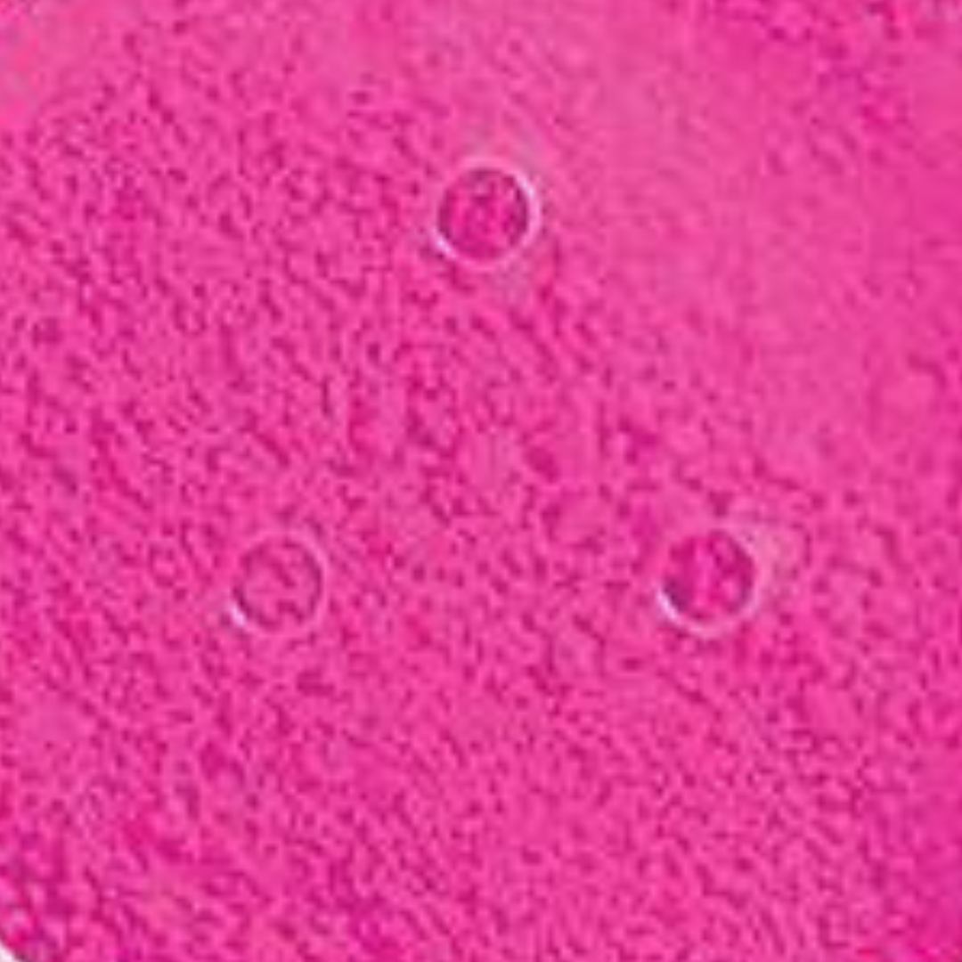 Close-up of pink textured fabric with circular patterns