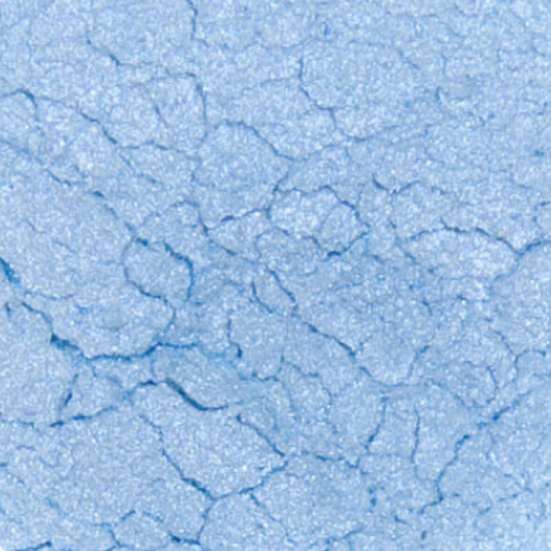 Close-up of a textured blue surface with cracks