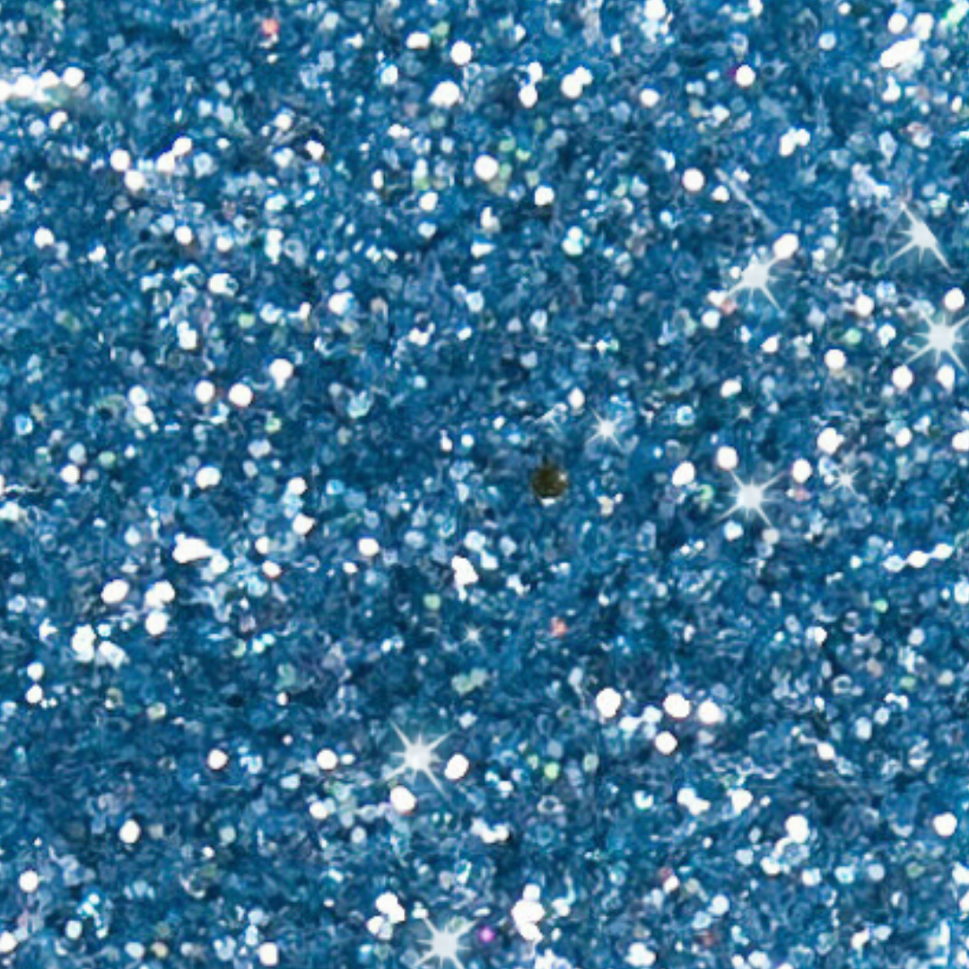 Close-up of blue glitter with sparkling effect