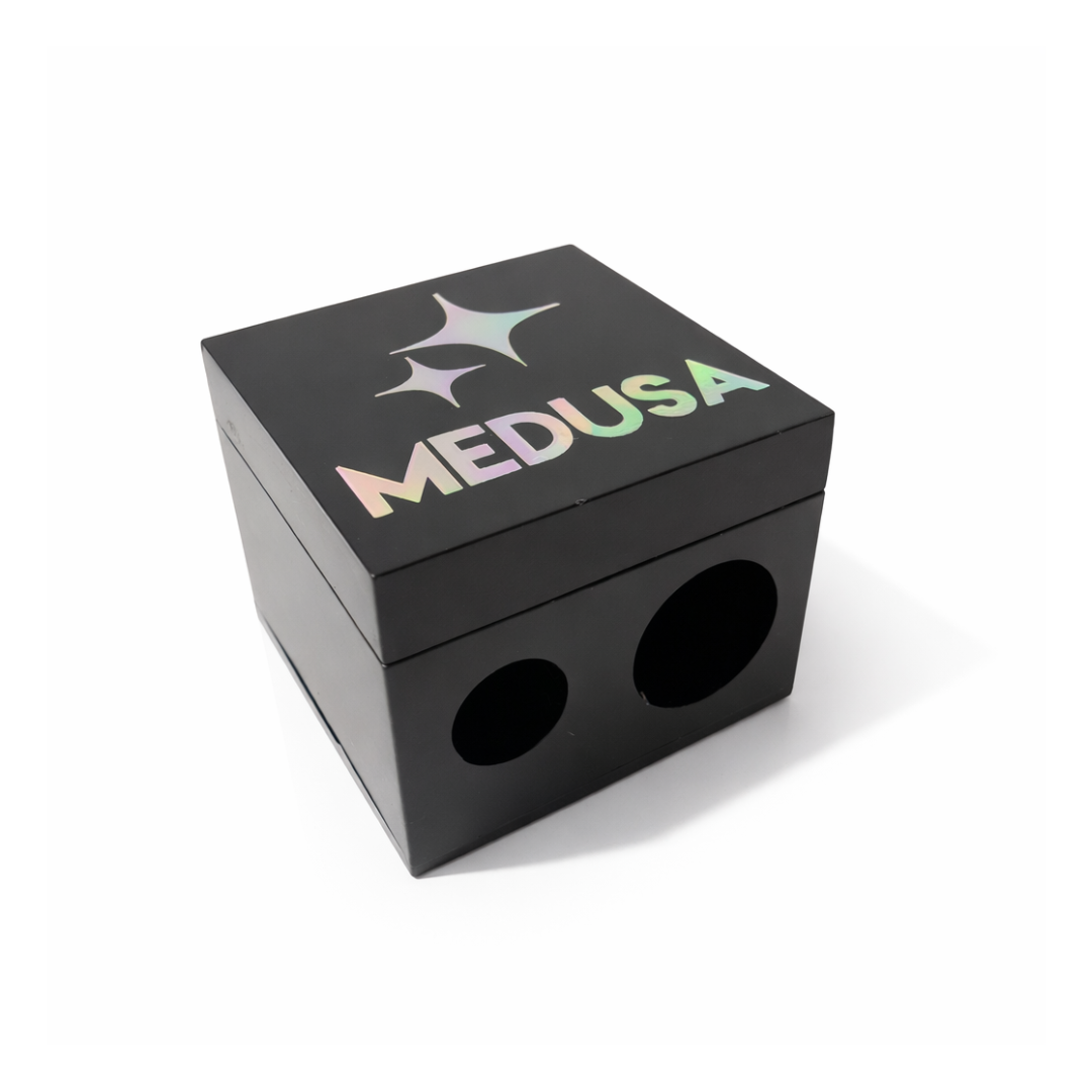 Black rectangular box with 'MEDUSA' branding on a white background