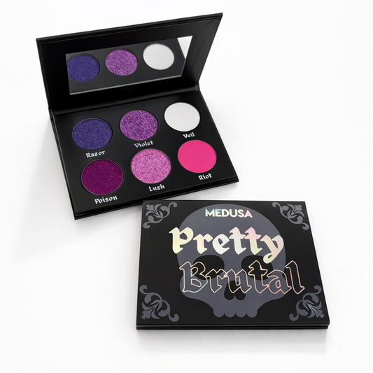 Makeup palette with colorful shades and 'Medusa Pretty Brutal' packaging on a white background