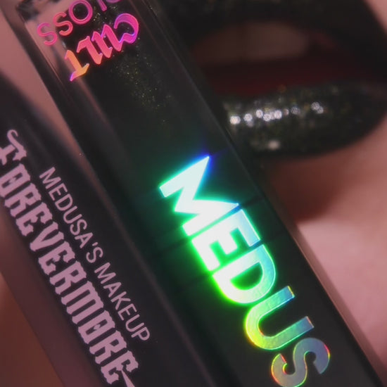 UGC video swatching lips with vinyl and dead serious