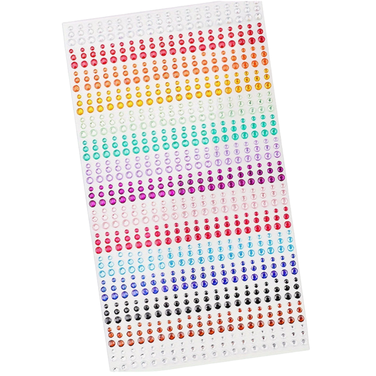 Sheet of colorful rhinestones on a white background