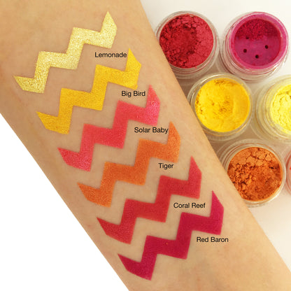 red and orange eye dust swatches