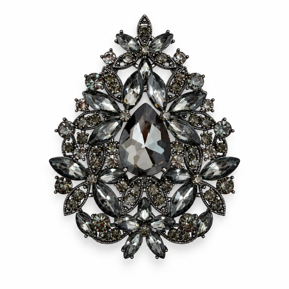 A teardrop-shaped brooch featuring a large faceted dark gray center stone surrounded by multiple marquise and oval-cut gray and smoky crystal stones in a dark metal setting, shown on a plain white background.
