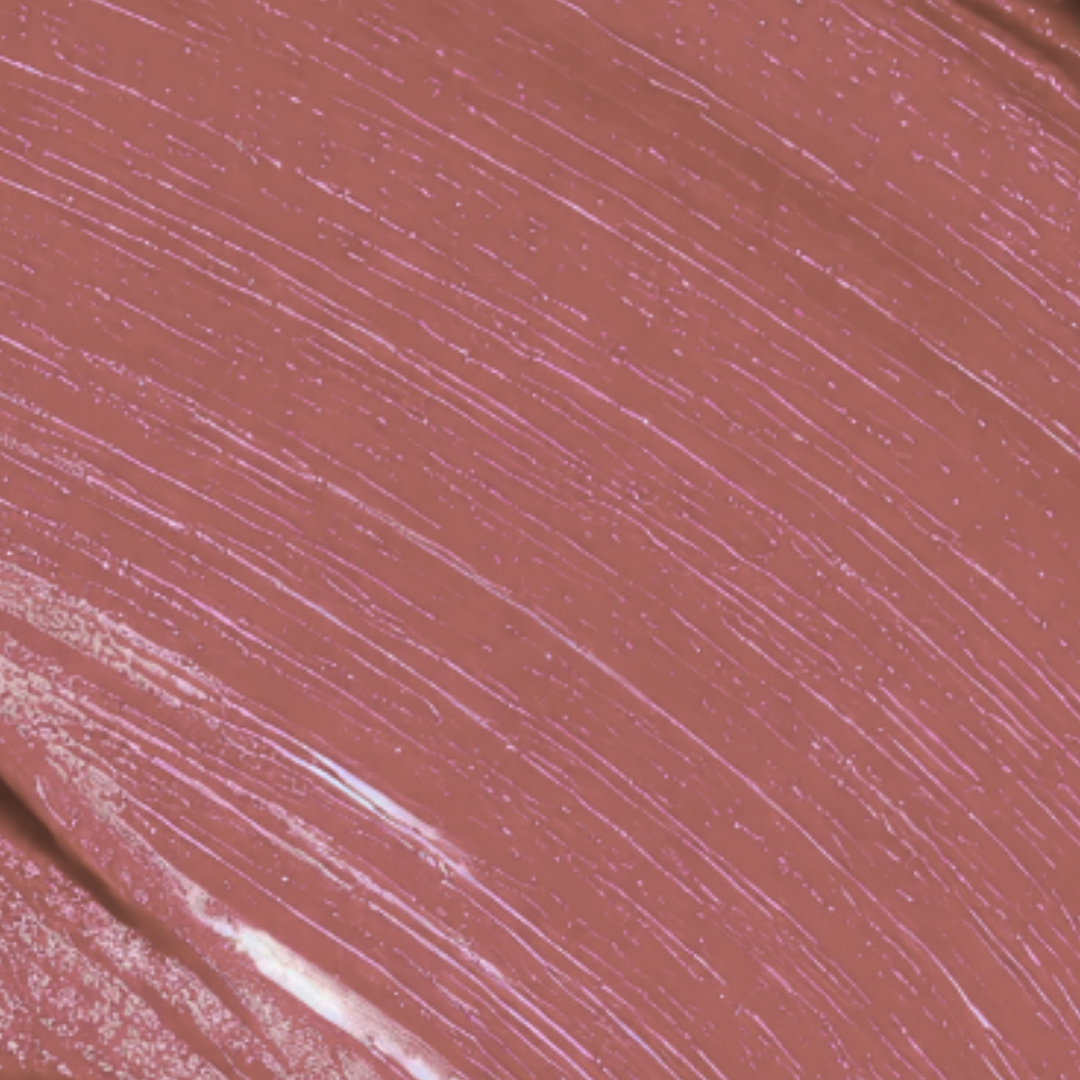 Close-up of a brown lip color swatch with visible texture