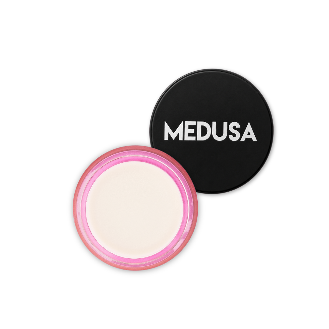 Cosmetic container with pink rim and black lid featuring 'MEDUSA' branding on a white background