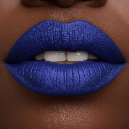 Close-up of a person wearing bright blue lipstick on a brown background