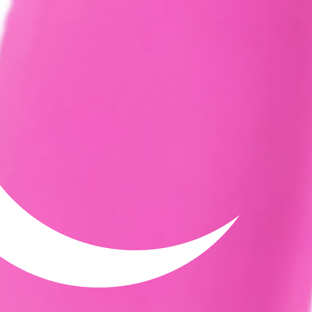Close-up of a pink surface with a white crescent moon design.
