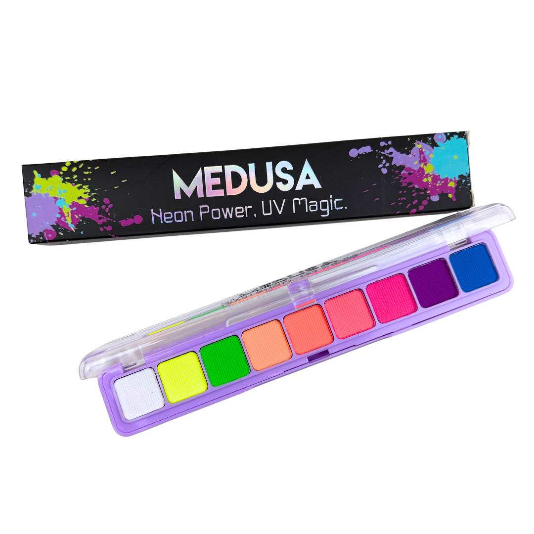 Medusa makeup palette with colorful shades and splatter design on packaging