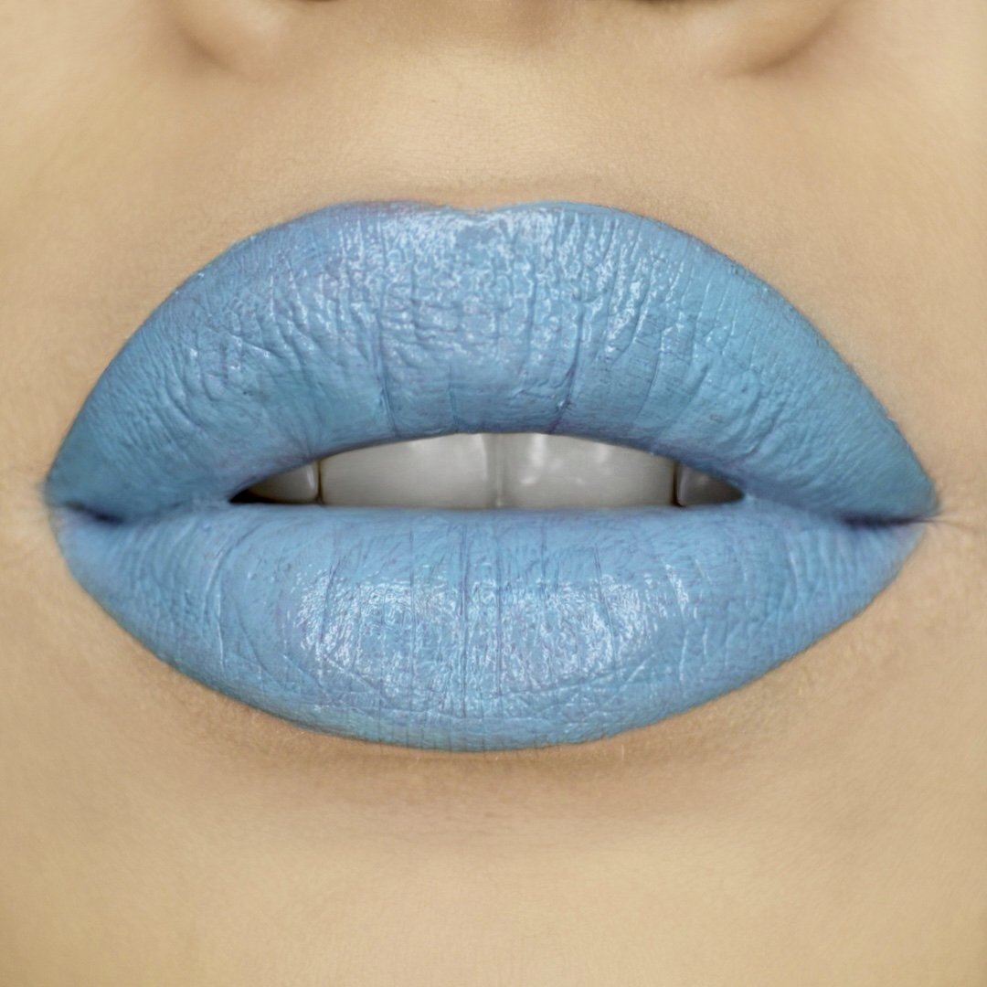 Model wearing Vegan Lipstick - Blue Moon