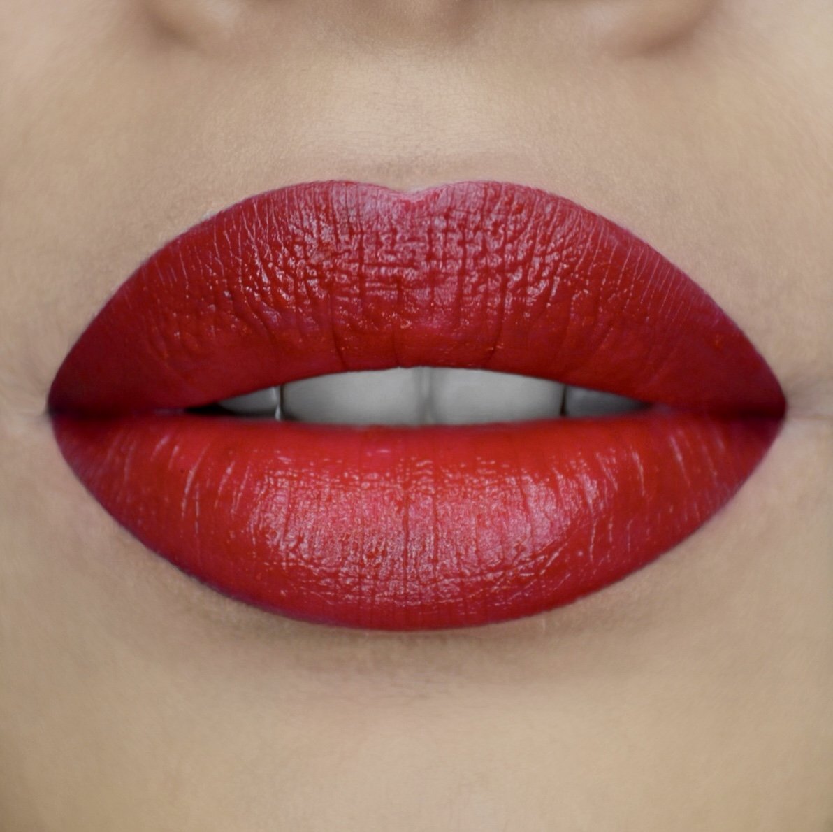 Model wearing Lipstick - Red Square
