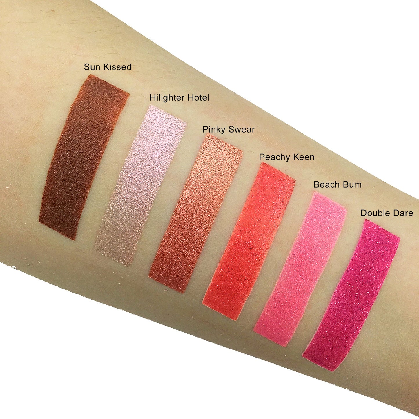 swatches on arm of various blushes