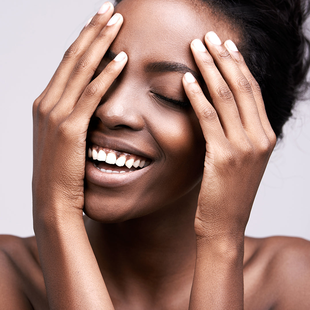 beautyiful African American skincare model.